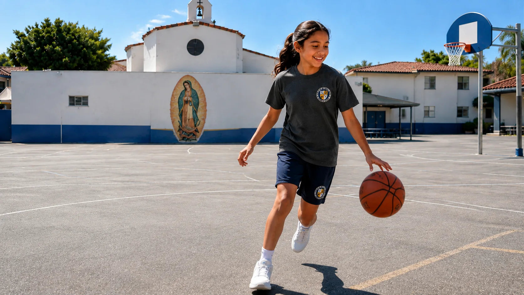 OLR student playing basketball in the school courtyard
