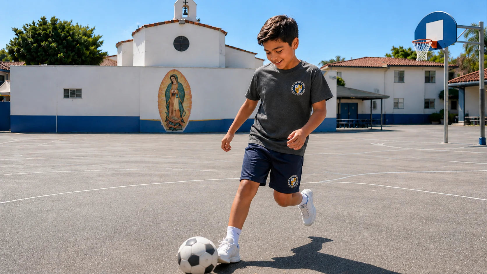 OLR student playing soccer in the school courtyard